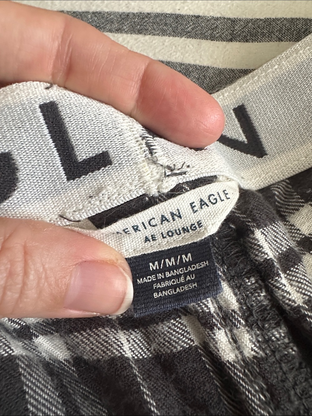 American Eagle Outfitters Black & White Plaid Snoopy Pajama Shorts - Picture 2 of 4